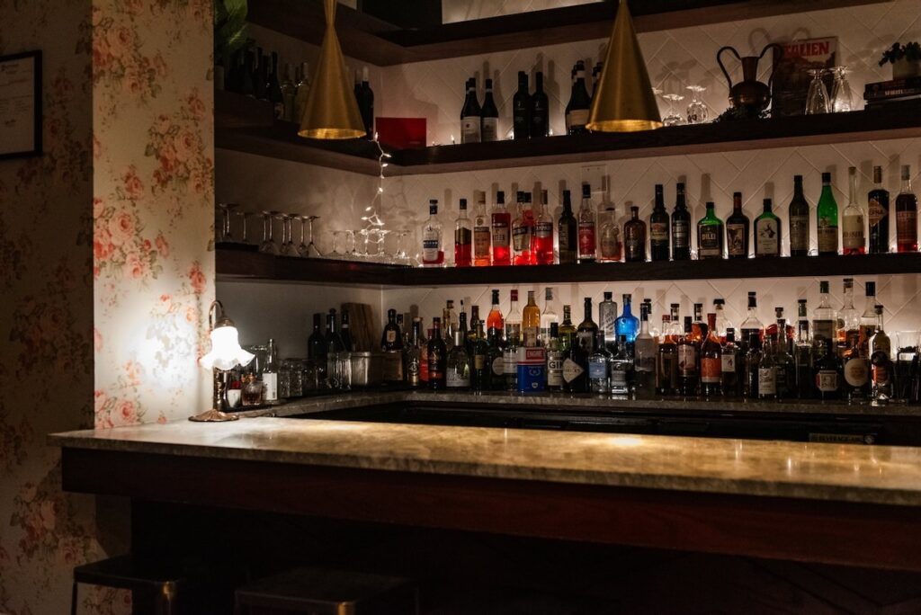 The dimly lit bar of The Aperitivo Club in Market Square.