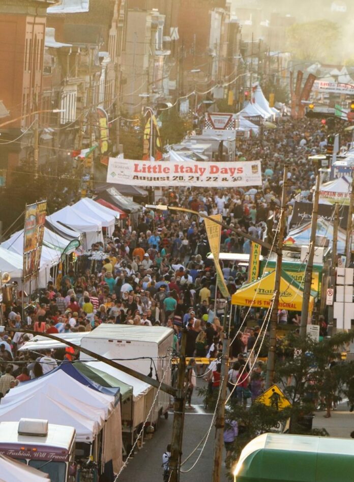 A street full of people and vendor booths at Bloomfield's Little Italy Days 2015.