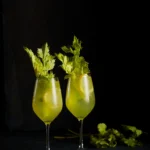 Two cocktails light green in color. called The Birdie