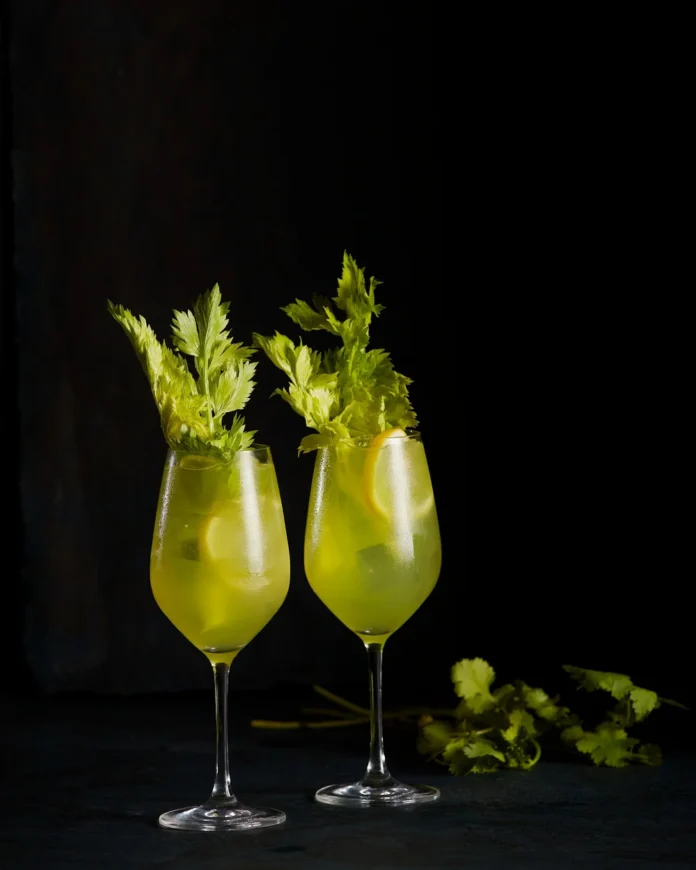 Two cocktails light green in color. called The Birdie