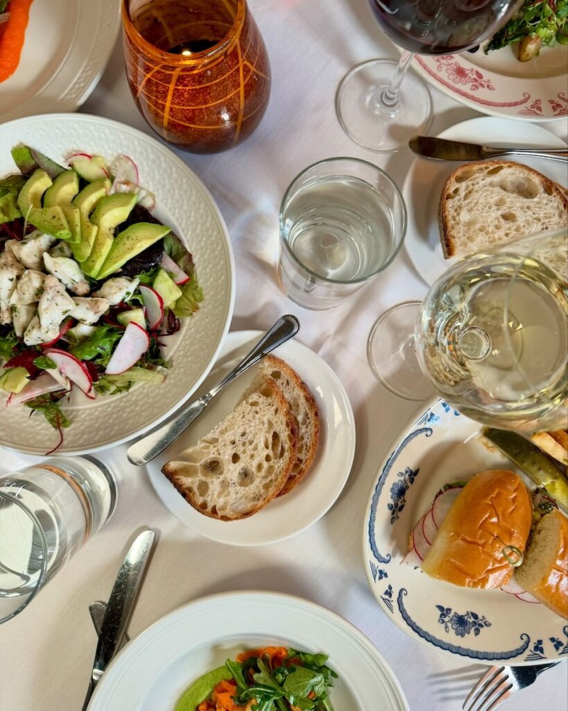 Plates on a white table from Casbah.