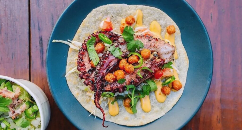 A bowl from Tako Torta with octopus, its signature dish.