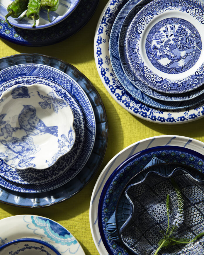 an aerial view of stacks of plates and bowls featuring various blue patterns. artist-made holiday gifts Pittsburgh