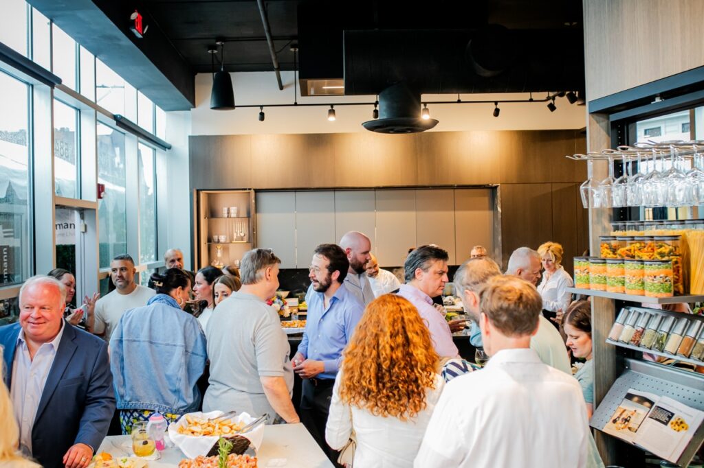 A bunch of people peruse through Eggersmann Studios Pittsburgh.