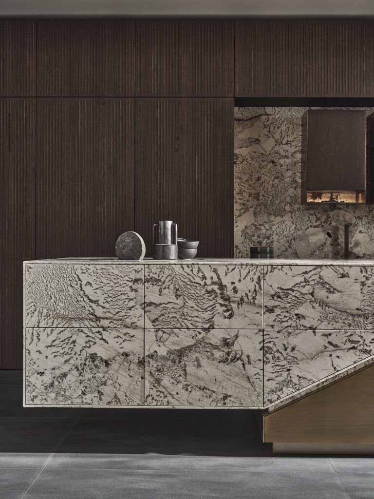 Osaka, a deeply textured wood material that emanates warmth and quiet luxury.