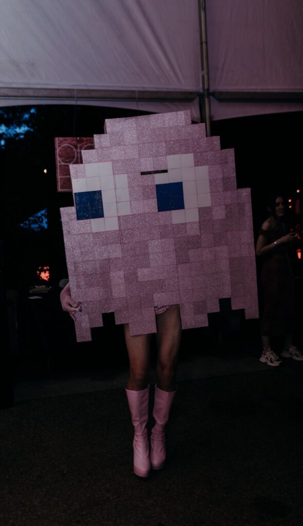 A pink pacman ghost costume with pink boots