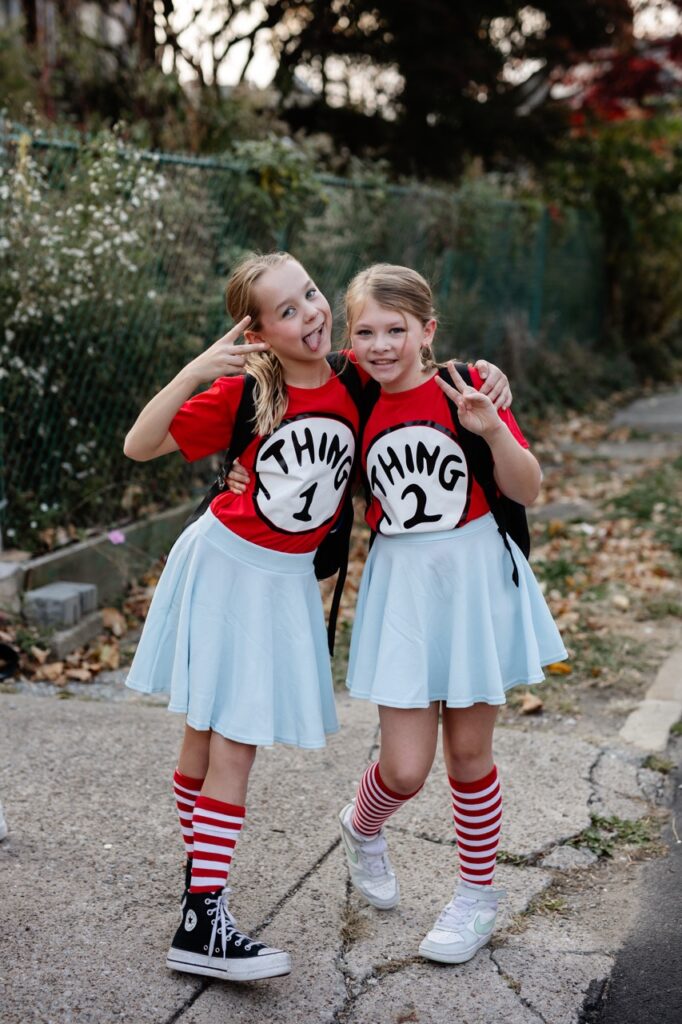 Two girls dressed as Thing 1 and Thing 2.
