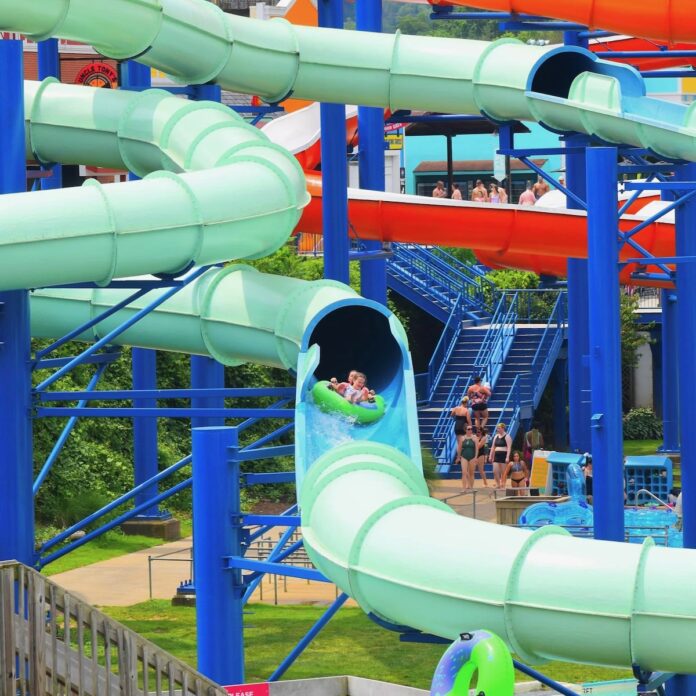 A little girl slides down a waterslide in Pittsburgh as a last minute summer activity.