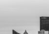 7 Pittsburgh Modern Buildings Worth Looking Up For The buildings of Pittsburgh in black and white from afar.