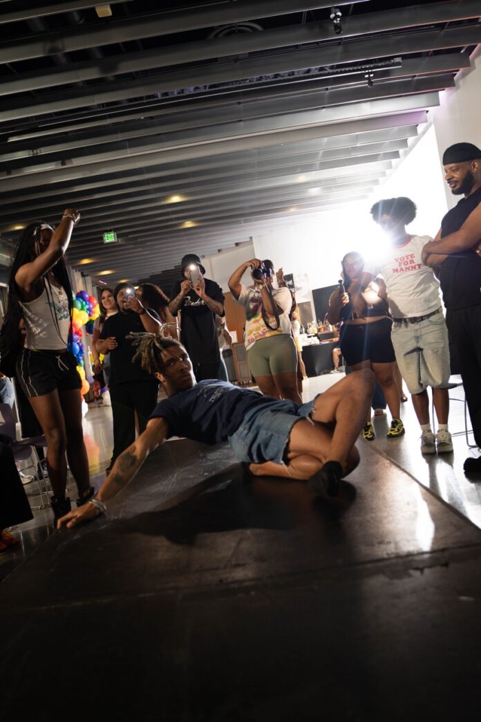 A person death drops on the stage.