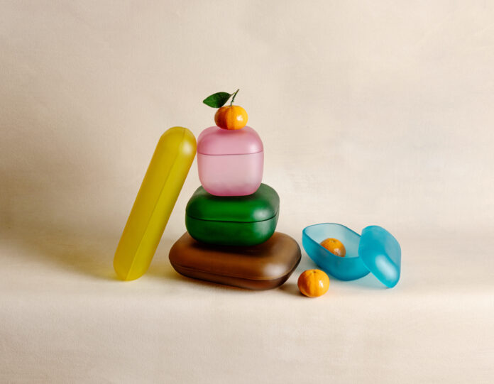 A collection of storage boxes into five sizes and a range of vibrant jewel tones.