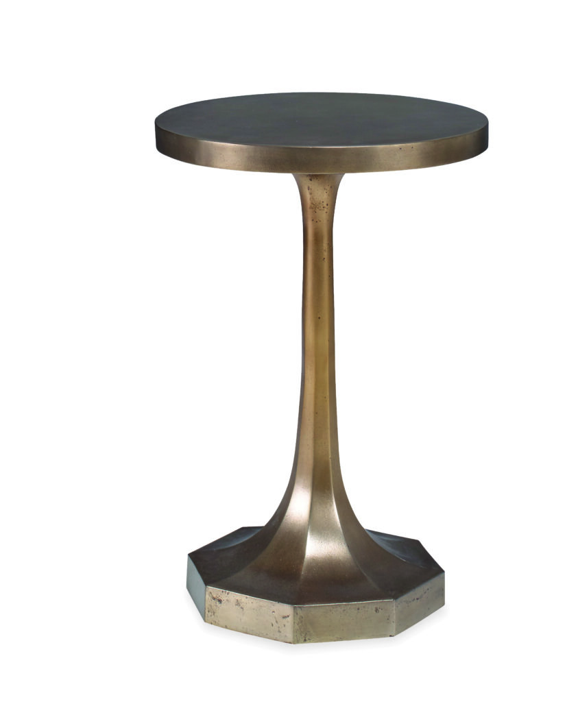 this drinks table with an antique brass finish dresses up any seat it’s pulled next to.