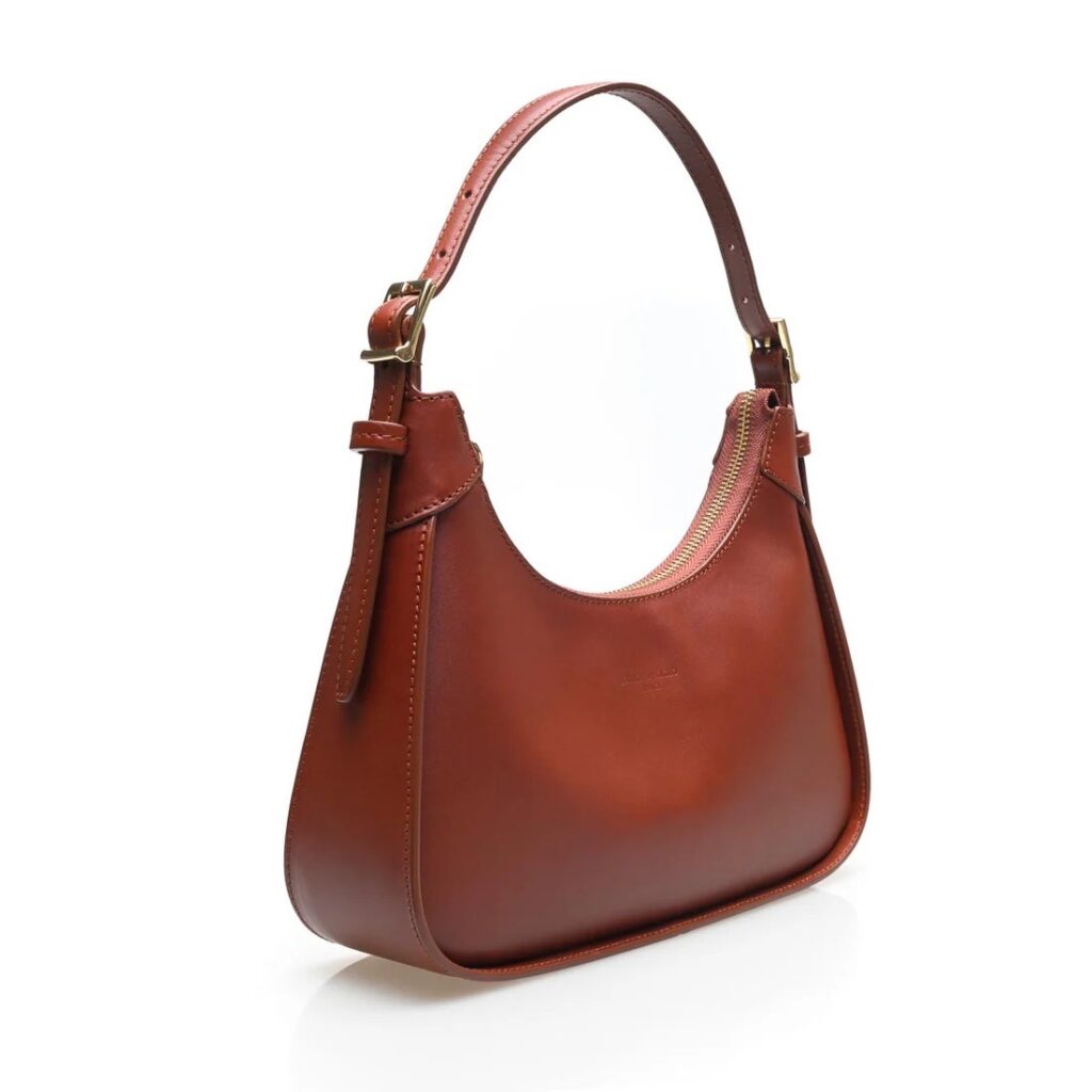 A brown purse on a white background.