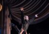 7 Halloween Concerts and Performances in Pittsburgh 2025 A shirtless dancers lifts a Dracula dancer in a Halloween dance performance.