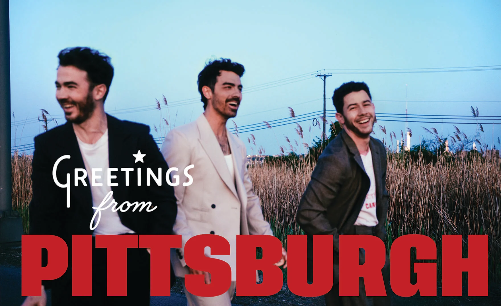 Jonas Brothers tour image taken in a field