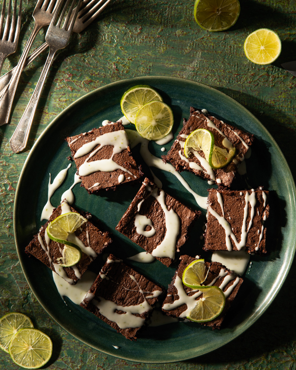 Chocolate brownies with a powdered sugar lime glaze