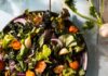 Quick and Easy Dinners from Anna Franklin A plate of salad on a white background, paired with vinaigrette.