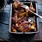 A pan full of chicken in mustard and applestroop.