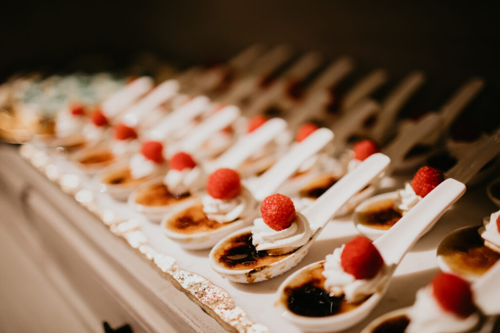 wedding dessert spread out with red cherries