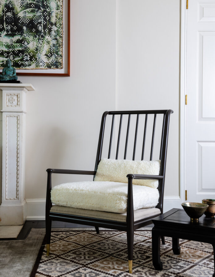Pittsburgh's Furniture Repair Shop Experts A repaired simple black chair with white cushions