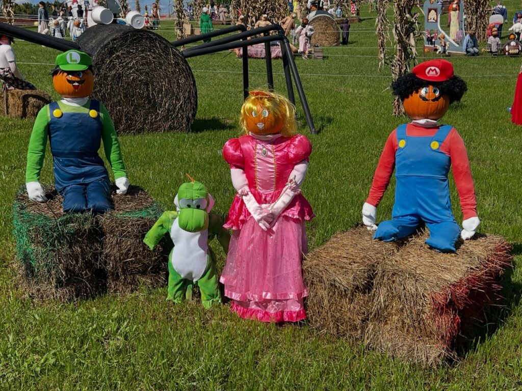 Mario, Luigi, and Princess Peach pumpkin figures at a Pittsburgh pumpkin patch.
