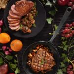 Apple Cider-Brined Pork Chops with Apple Sausage Hash and Whipped-Honey Rodeo Chèvre and Seared Duck Breast with Wild Mushrooms