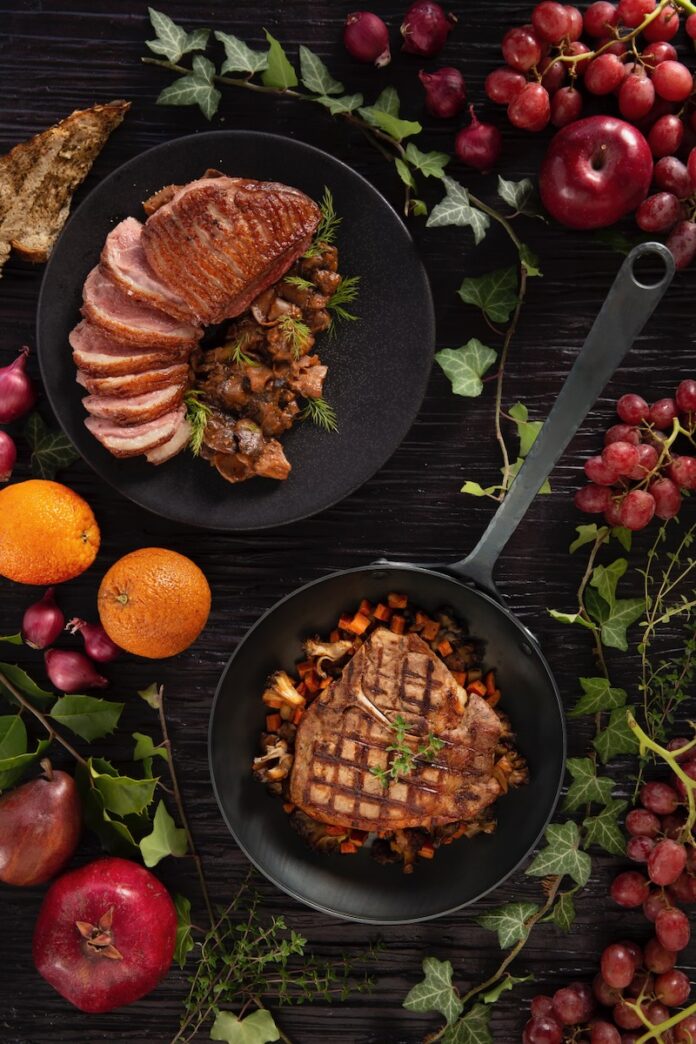 Boxing match Cooking Competition Apple Cider-Brined Pork Chops with Apple Sausage Hash and Whipped-Honey Rodeo Chèvre and Seared Duck Breast with Wild Mushrooms