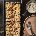 A Blueberry Maple Pie with leave lattice pie crust work on top.