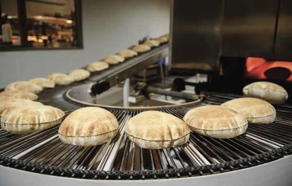 pita bread on cooking machine