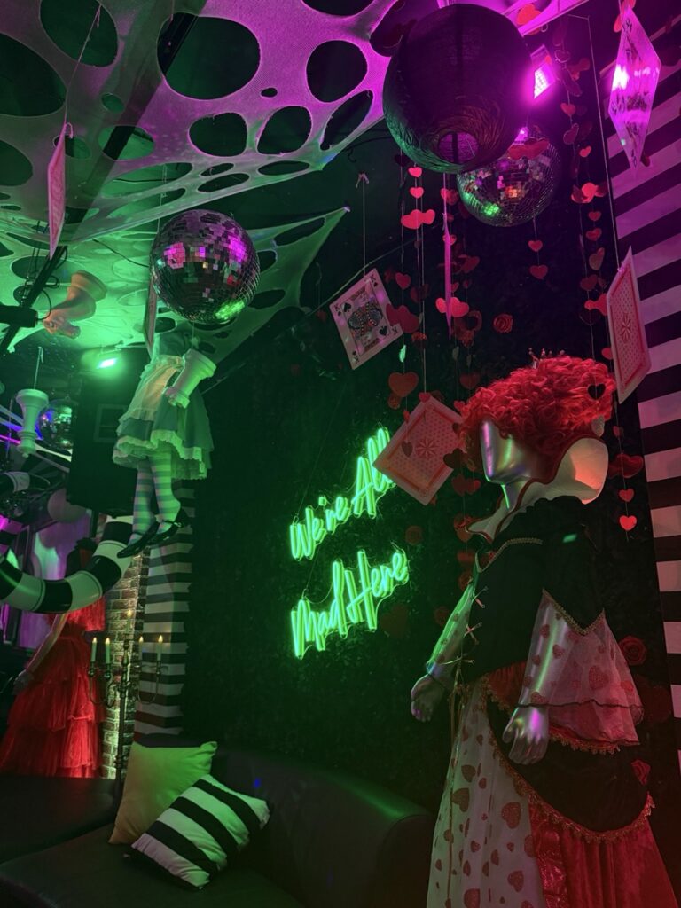 Alice in Wonderland themed decor at a Pittsburgh Halloween bar