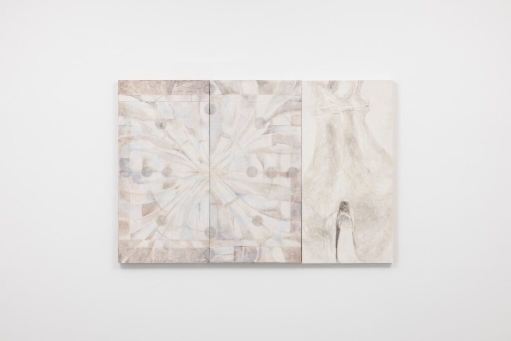 A grey and white three set painting on a white gallery wall.