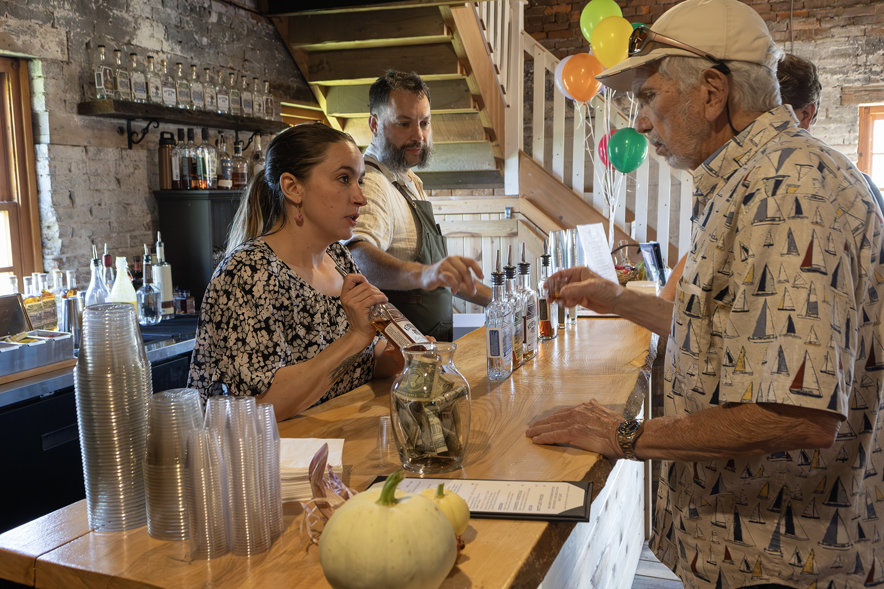The Whiskey Smash a man at the bar ordering a whiskey
