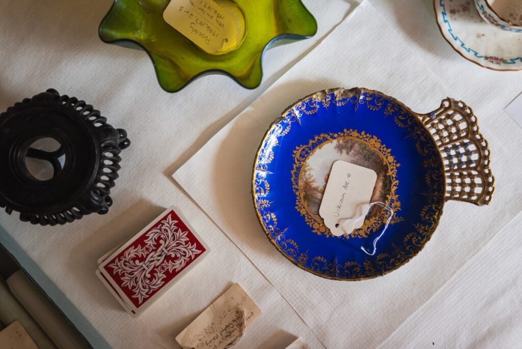 Glass bowls with tags for objects at the Frick Clayton