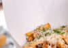 What’s Hot on Pittsburgh Menus: November 2025 A basket full of truffle fries with cheese on top at a Pittsburgh restaurant.