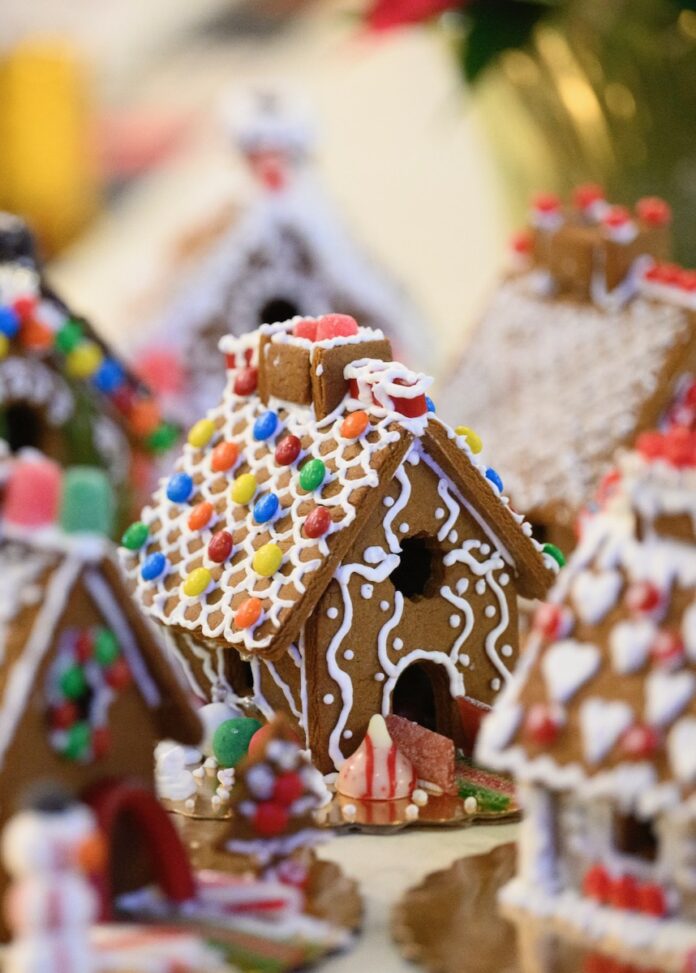 Gingerbread Local Provisions TABLE Magazine A gingerbread house with M&Ms all over the gingerbread.