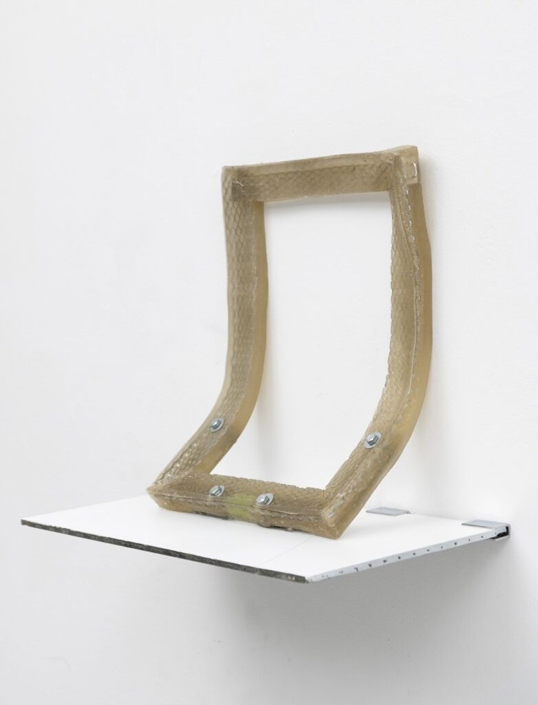 A frame melting and bending off a gallery wall.
