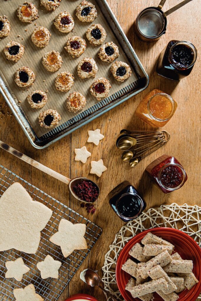 Cookies and cookie materials on table