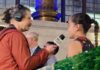 Giving Guide 2025: Pittsburgh Community Broadcasting A photo of a woman interviewing a young girl above a photo of a woman playing guitar on stage for a crowd.