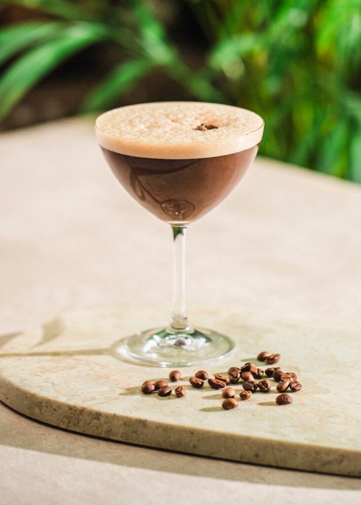 Espresso Maiztini with coffee beans in foreground