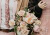 Florists in Pittsburgh for All Your Valentine’s Day Needs A woman and man walk with a bouquet of pink flowers between them.