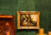 Pittsburgh Events: Your Guide to March 16-22 An art painting hangs on a green museum wall at The Frick Pittsburgh.