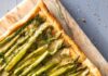 Asparagus Recipes for Spring’s Never Ending Bounty A rectangular Asparagus Tart with stalks of asparagus lined on top of the pastry.