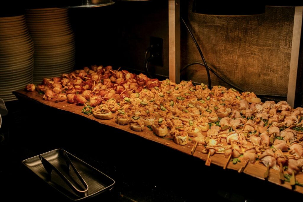 A table full of small bites of food.