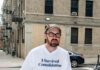 Pittsburgh Native Conor Hannon Produces Oscar-Nominated ‘If I Had Legs I’d Kick You’ Conor Hannon stands in a white t shirt with a baseball cap on and a camera in his hands.