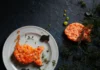 10 No-Fuss Summer Lunch Ideas On a white plate to the left sits Salmon Tartare in the shape of a goldfish. To the right sits Salmon Grilled Cheese.