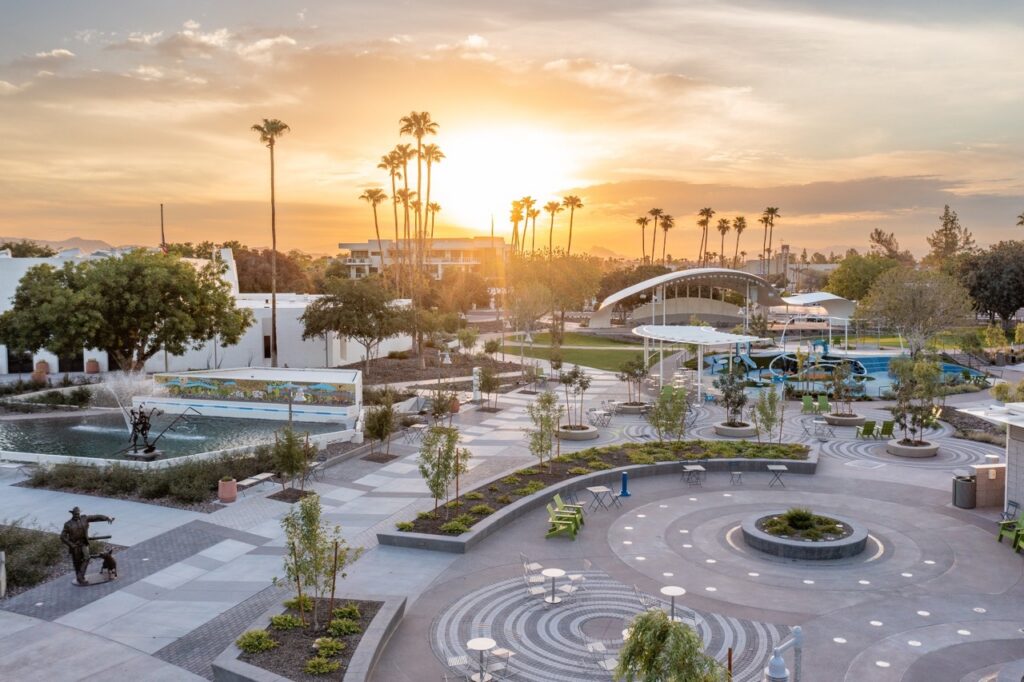 The city of Scottsdale Arizona with a sunset behind it.