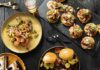 Black and Gold Recipes for Cheering on the Steelers Various plates of black and gold foods for the Steelers like BBQ pork sandwiches, tarts, cakes, grilled grimp, and tostadas.