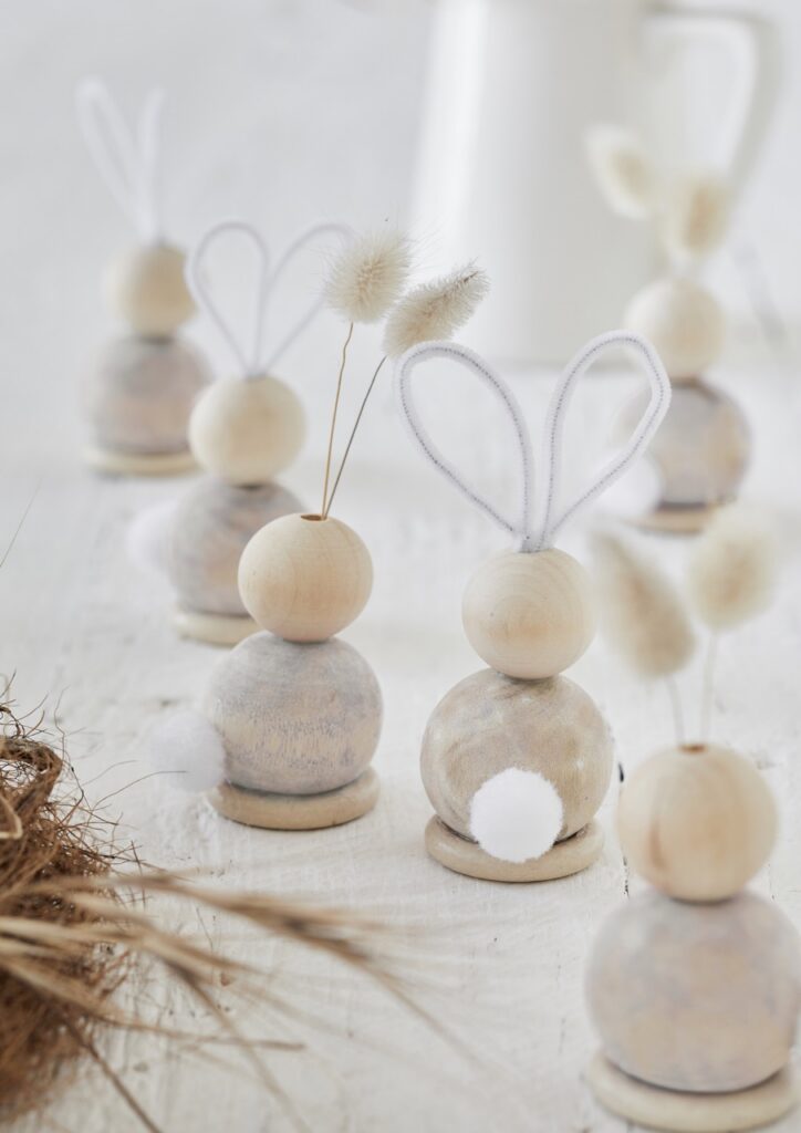 DIY bunnies made out of round balls and wire.