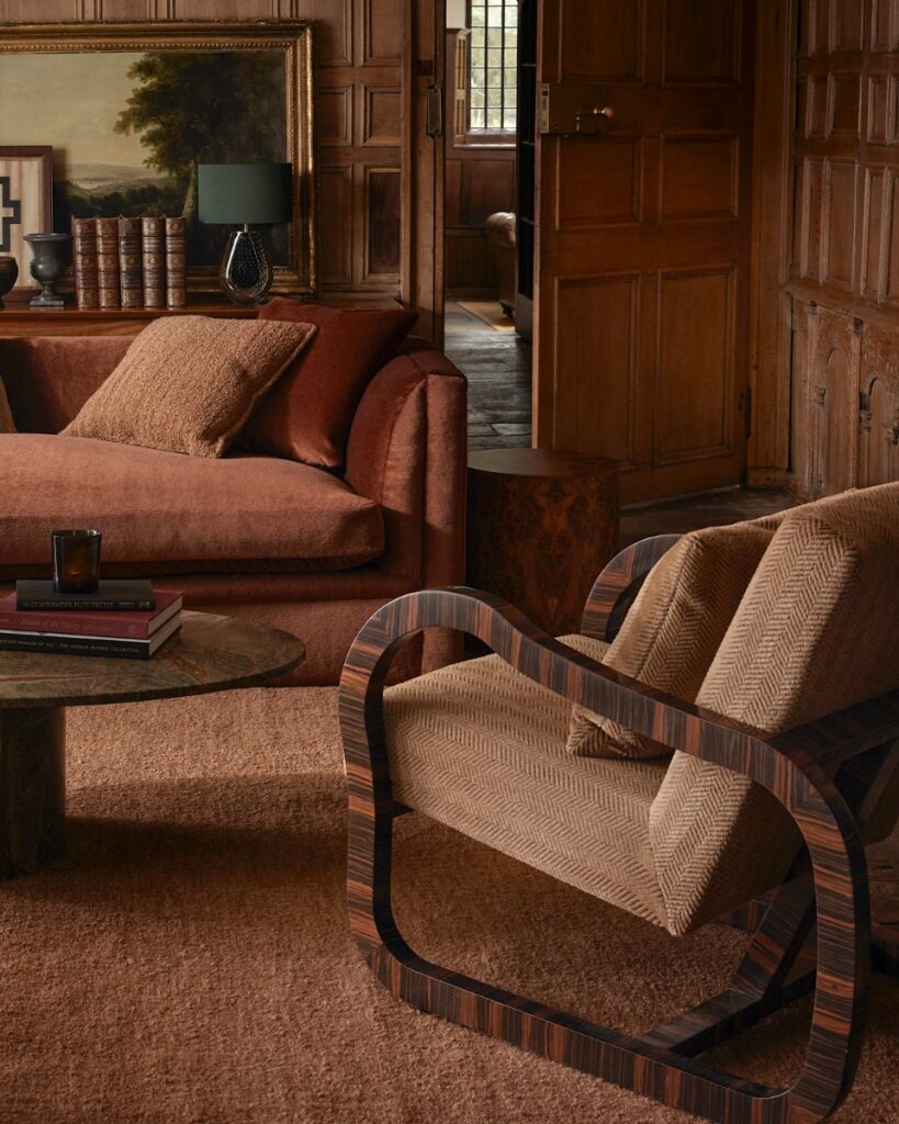 A Rosemary Hallgarten Antoinette rug in a soft neutral palette, styled in the historic and atmospheric Ashby Manor to showcase the Country Manor collection's blend of modern design and classic textures.