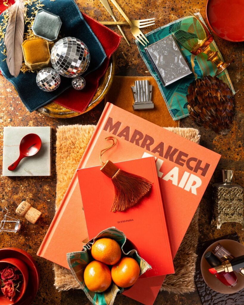 A vibrant interior design mood board by Jennie Bishop featuring a Taylor Swift-inspired palette with mint green fabrics, disco balls, Samuel & Sons tassels, and Chanel lipstick in Coco Flash.